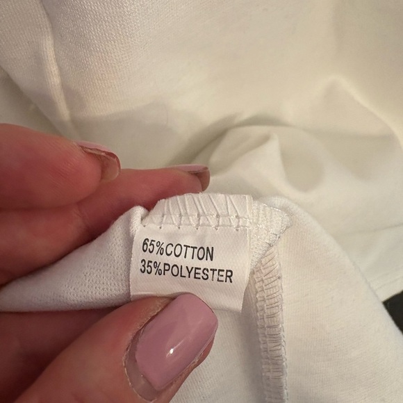 White Asymmetrical Mini Dress with a deep v neckline in size Medium - Picture 8 of 8